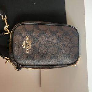 Coach Saddle Bag.  Black and Gold